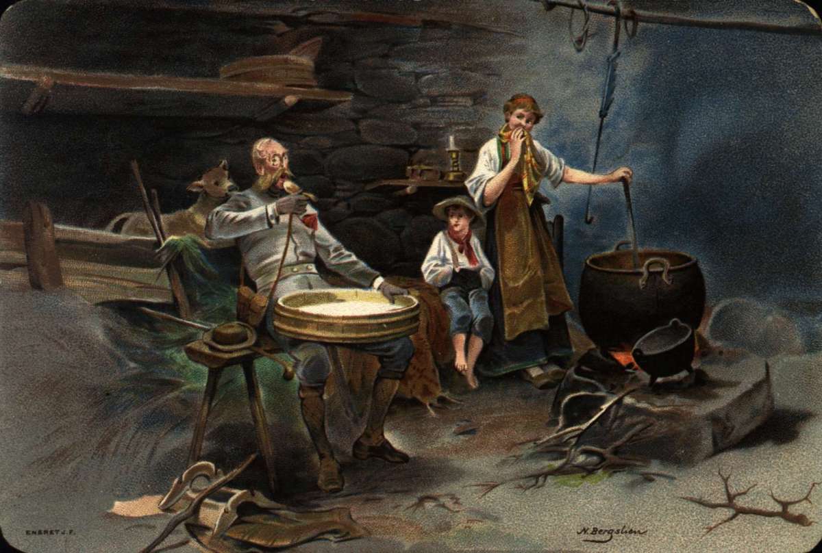Postkort. Jule- og nyttårshilsen. Interiør. En kvinne står ved grua og lager mat. Et barn står ved siden av henne. En mann spiser fra et grøtfat som han har på fanget. En kalv står i bakgrunnen. Datert 21.12.1898.