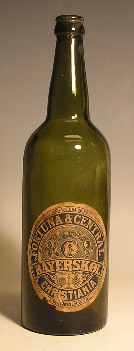 Flaske med sylindrisk korpus, innsnevrer til lang smal hals.