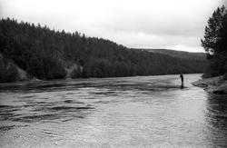 Landskap med person(er).