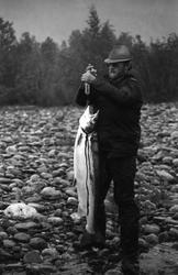 Fangst med person(er).