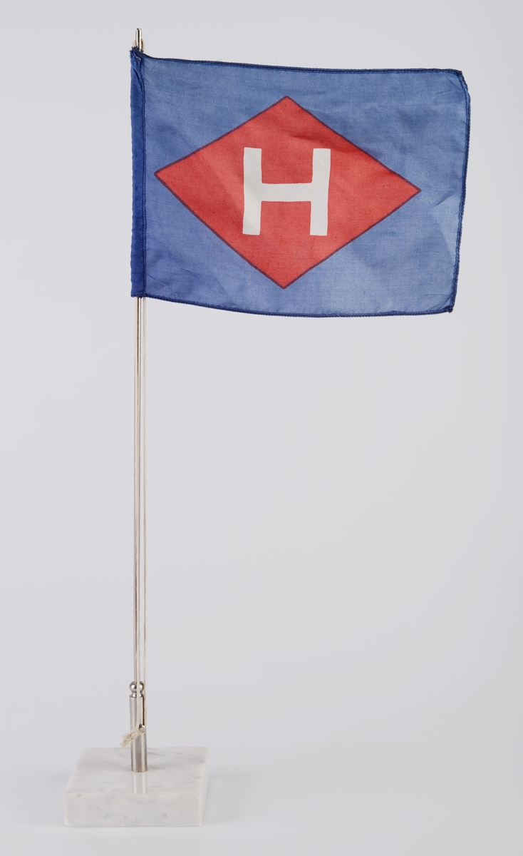 Bordflagg, rederiet H. E. Hansen-Tangen.