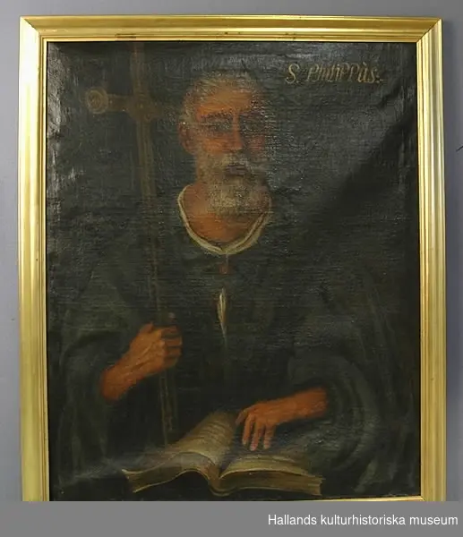 Oljemålning på duk. Aposteln Fillippus med blå mantel, grått skägg och sitt attribut: en korsstav.