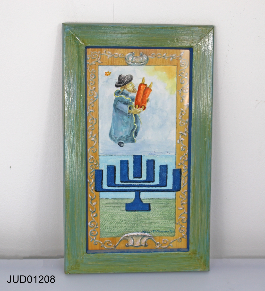 Inramad målning med motiv föreställande menorah och man med Torah-rulle