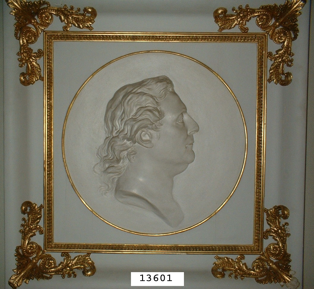 Porträttmedaljong Gjuten relief föreställande af Chapman, inom ram av trä.