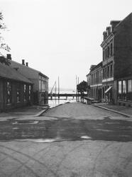 Gateparti fra Hamar under storflommen i Mjøsa i juni 1927. D