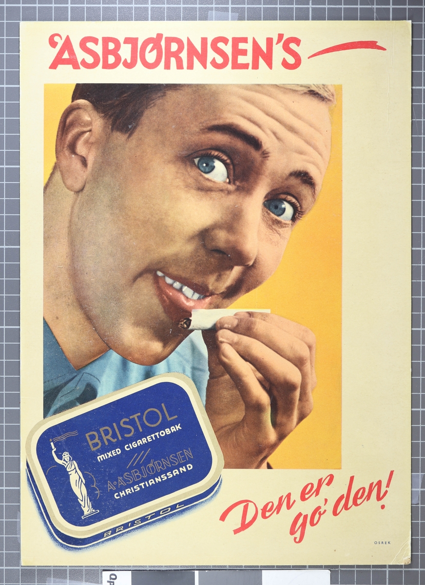 Boks med Bristol tobakk foran mann som slikker sigarettpapir. Under står teksten "Den er go'den!"