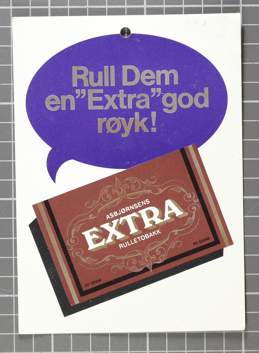En pakke Extra rulletobakk med en taleboble over der det står "Rull dem en "Extra" god røyk!"