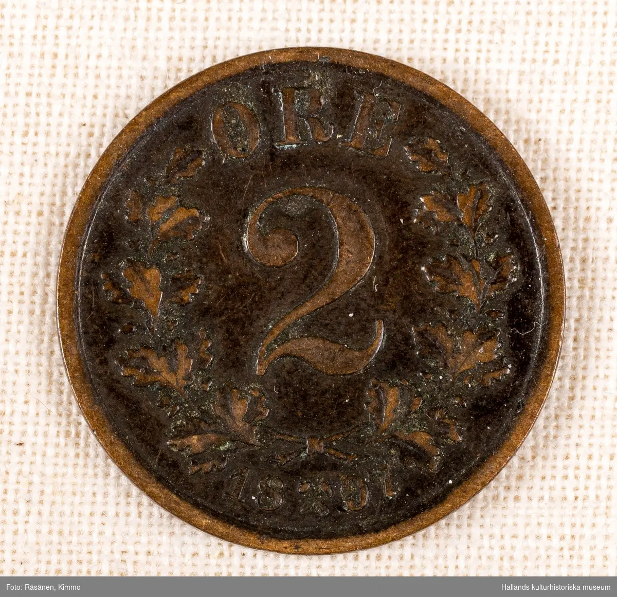 Mynt av koppar. 2 ØRE (öre).1897Oscar IIs namnchiffer (teckning)
