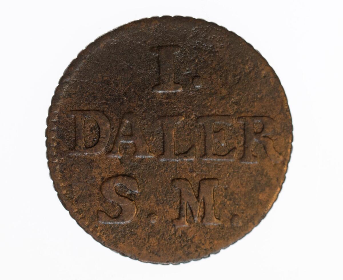 Mynt, 1 daler s.m. 1715 från Karl XII tid