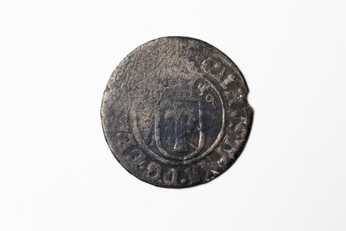 Ett öre silvermynt, präglat i Stockholm, drottning Kristina. Årtalet är otydligt men möjligen 1649.