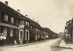 Tollbodgaten i Kristiania/Oslo. Kopiert av Johannes Holmsen 