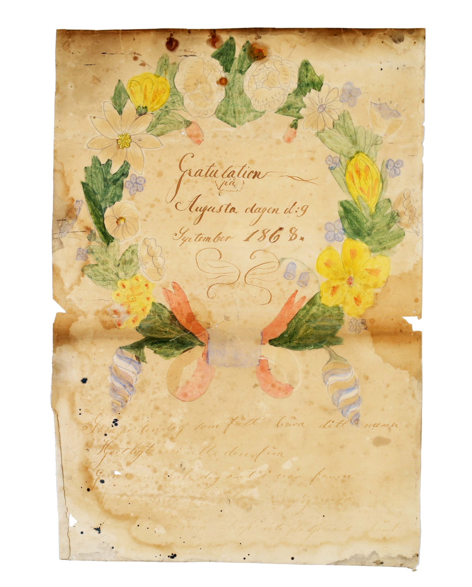 Minnestavla med texten: "Gratulation på Augusta dagen d:g September 1868", inom flerfärgad blomsterkrans. Vers nedtill: "Skön är den dag...........
glädje och fröjd".

Funktion: Minnestavla vid namnsdag