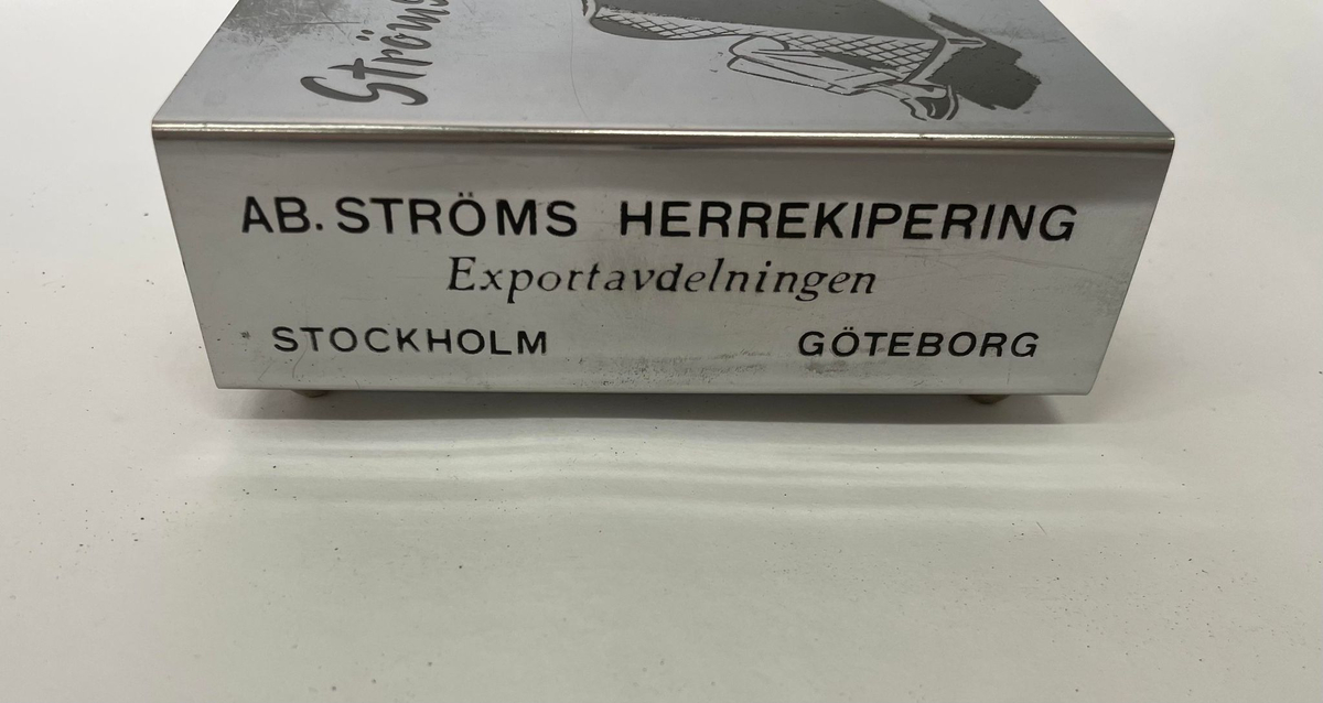 Hållare för tändstickask, AB. Ströms Herrekipering, Exportavdelningen Stockholm-Göteborg