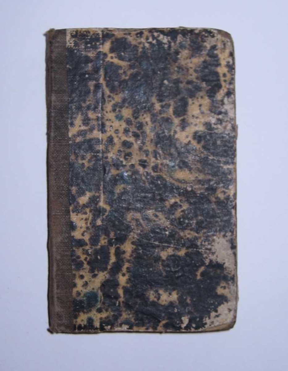5 utgaver av månedsskriften bundet inn sammen som ei liten bok, innbundet i marmorert papir