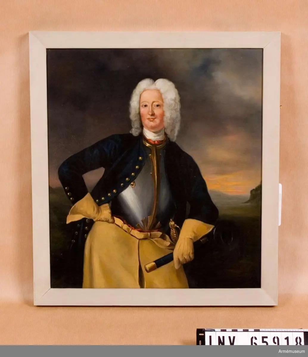 Grupp M I. 
Oljemålning i form av porträtt föreställande Carl Cronstedt f. 1672 d. 1750, friherre, generallöjtnant, president i Krigskollegium, det svenska artilleriets skapare. 
Porträttet är en kopia utfört av Henrik Scheffel (1690-1781).  Cronstedt är porträtterad framifrån lutad mot en kanon. Han bär vit och röd halsbindel, harnesk karolinsk dräkt och långa kraghandskar. Huvudet är bart med peruk. Infattning: förgylld träram, utomkring slät, innanför pärlkant.