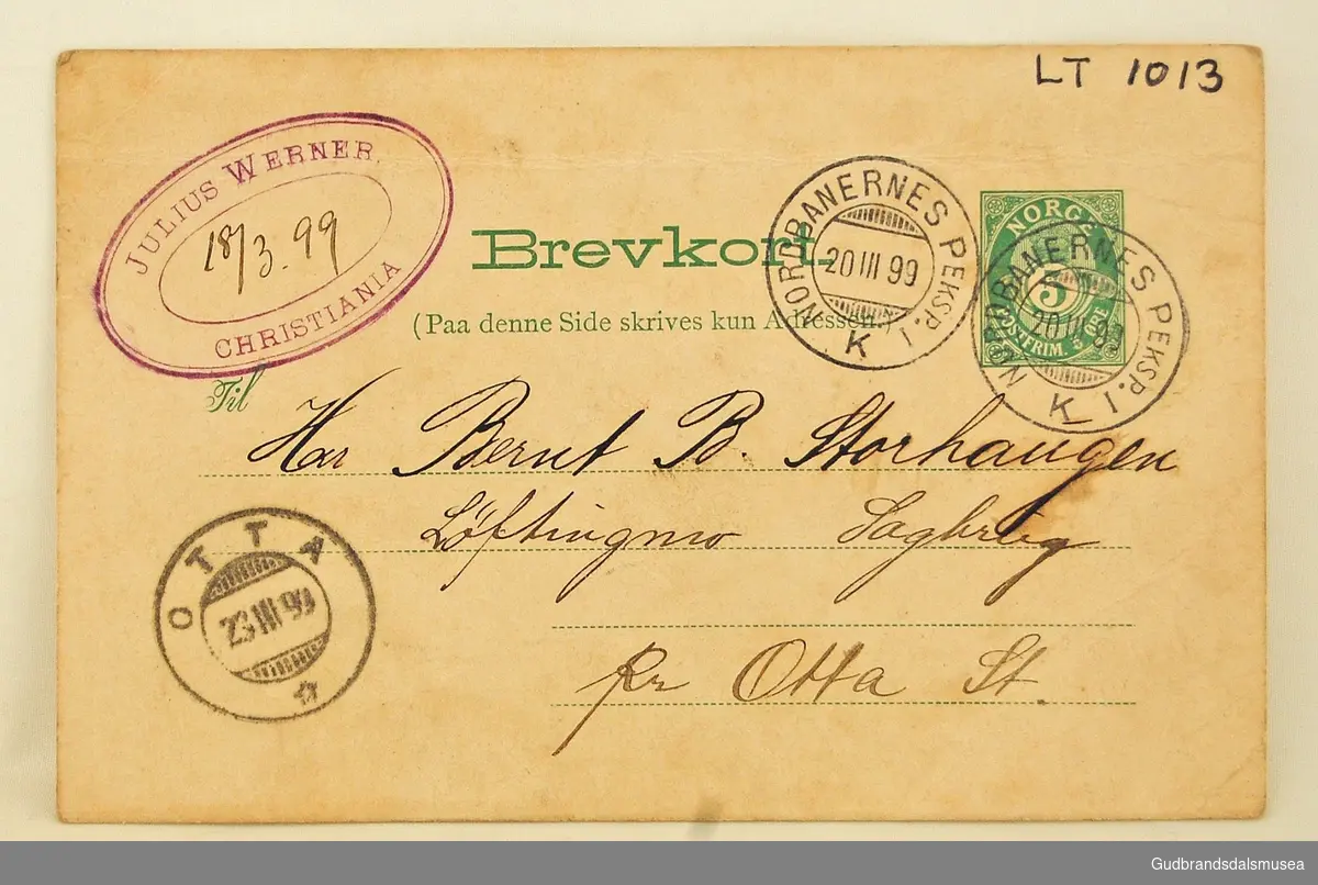 Rektangulært brevkort i kartong, trykt og håndskrevet, datert 1899.