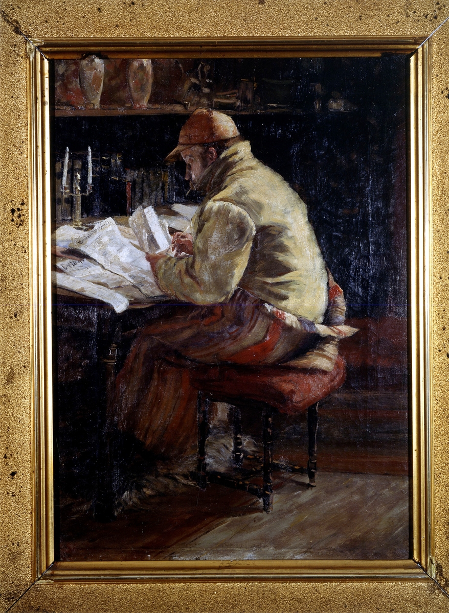 Alexander Kielland i arbeid ved skrivebordet på en låve i Frankrike.