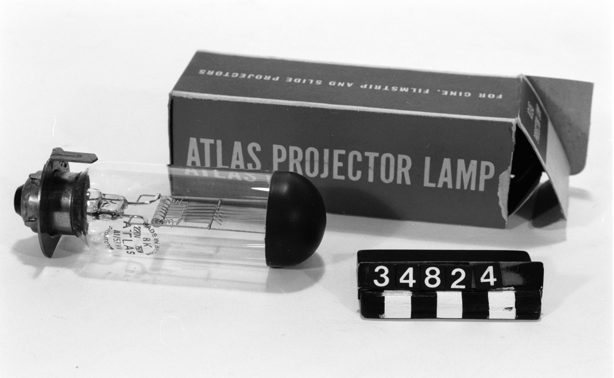 Projektorlampa av märket: Atlas i K A1
Tillbehör: Kartong.