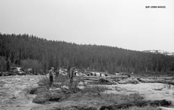 Utislag av tømmer i elva Lebba, et av tilløpene til et vassd