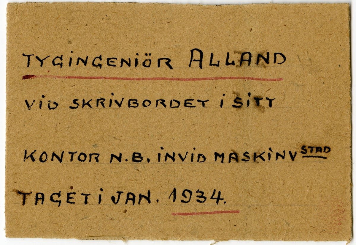 Tygingenjör Carl Einar Walfrid A:son Alland vid skrivbordet, januari 1934.

Se även bild AMA.000777, AMA.0000910 och AMA.0000945.