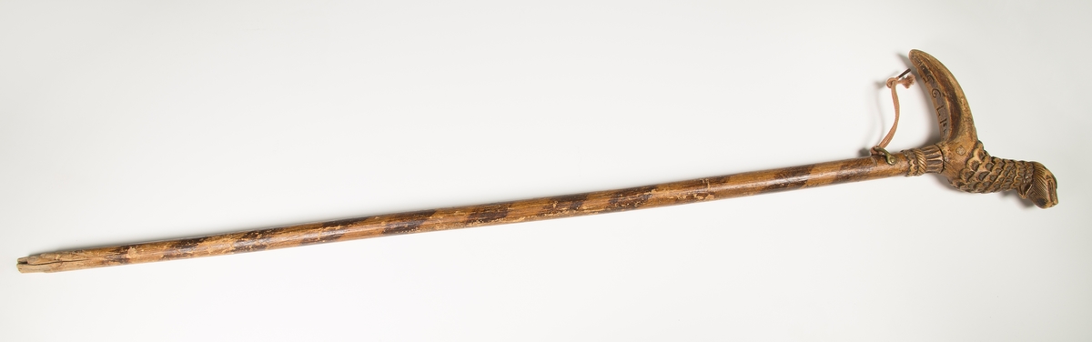 Håndtak skåret som fugl