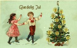 Julekort. Jule- og nyttårshilsen. En gutt og en jente danser