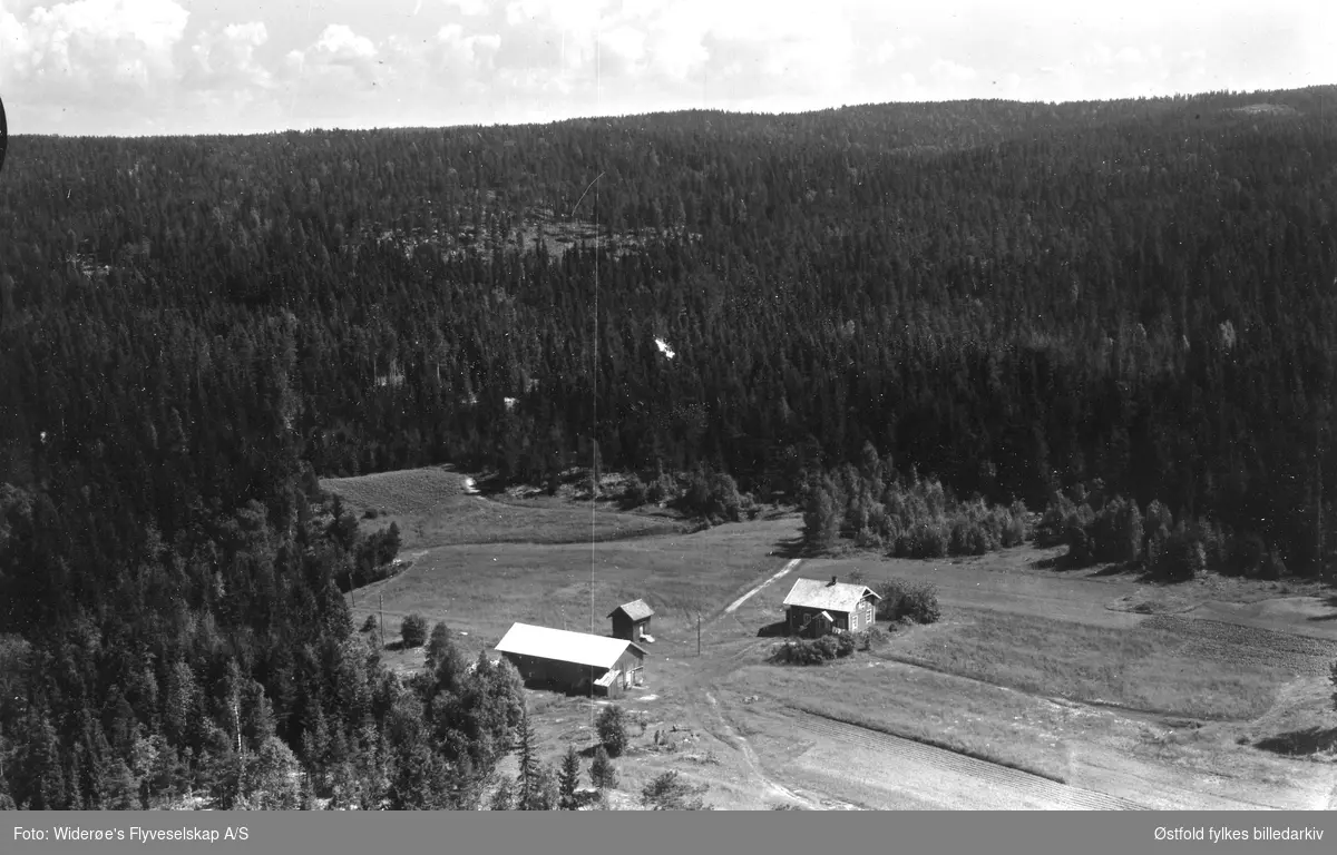 Haugbakk 74/17. Flyfoto fra Rømskog.