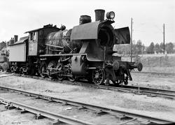 Utrangert damplokomotiv type 24b nr. 196 på huggesporet på G
