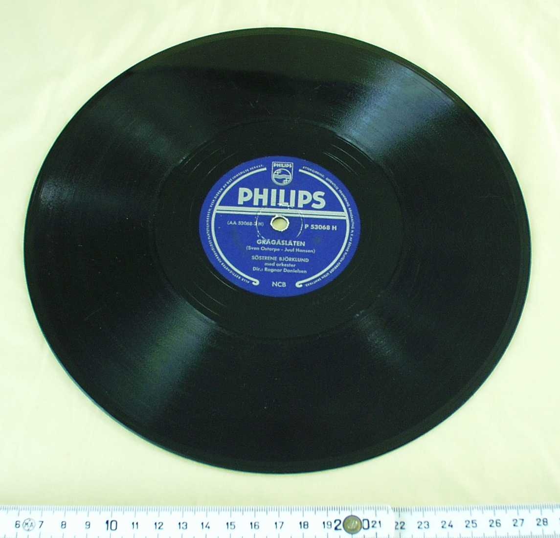 Grammofonplate. Sort med blå etikett. Sølvfarget skrift. Philips-logo