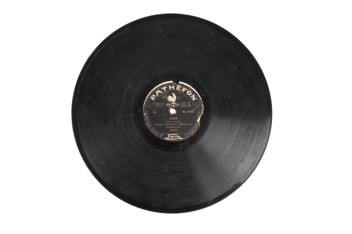 Grammofonplate av skjellakk med originalt plateomslag.