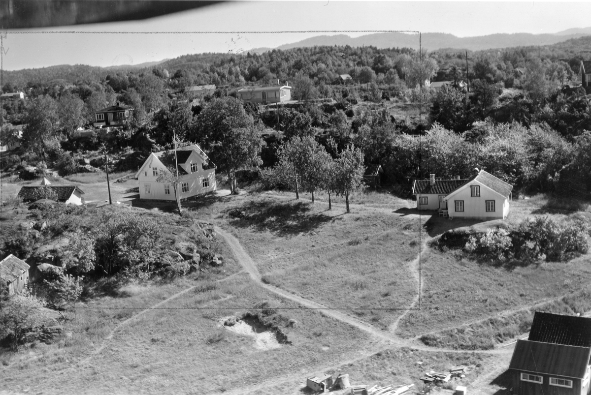 Flyfotoarkiv fra Fjellanger Widerøe AS, fra Porsgrunn Kommune. Sandøya. Fotografert 08.08.1959. Fotograf J Kruse