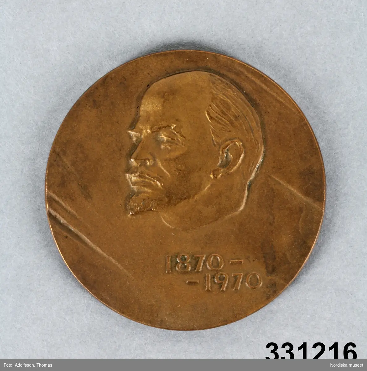 Medalj, rund. På åtsidan bild i relief föreställande Lenin och på årtalen "1870-1970". På frånsidan text på ryska och eliptisk figur.
/Leif Walllin 2011-02-03