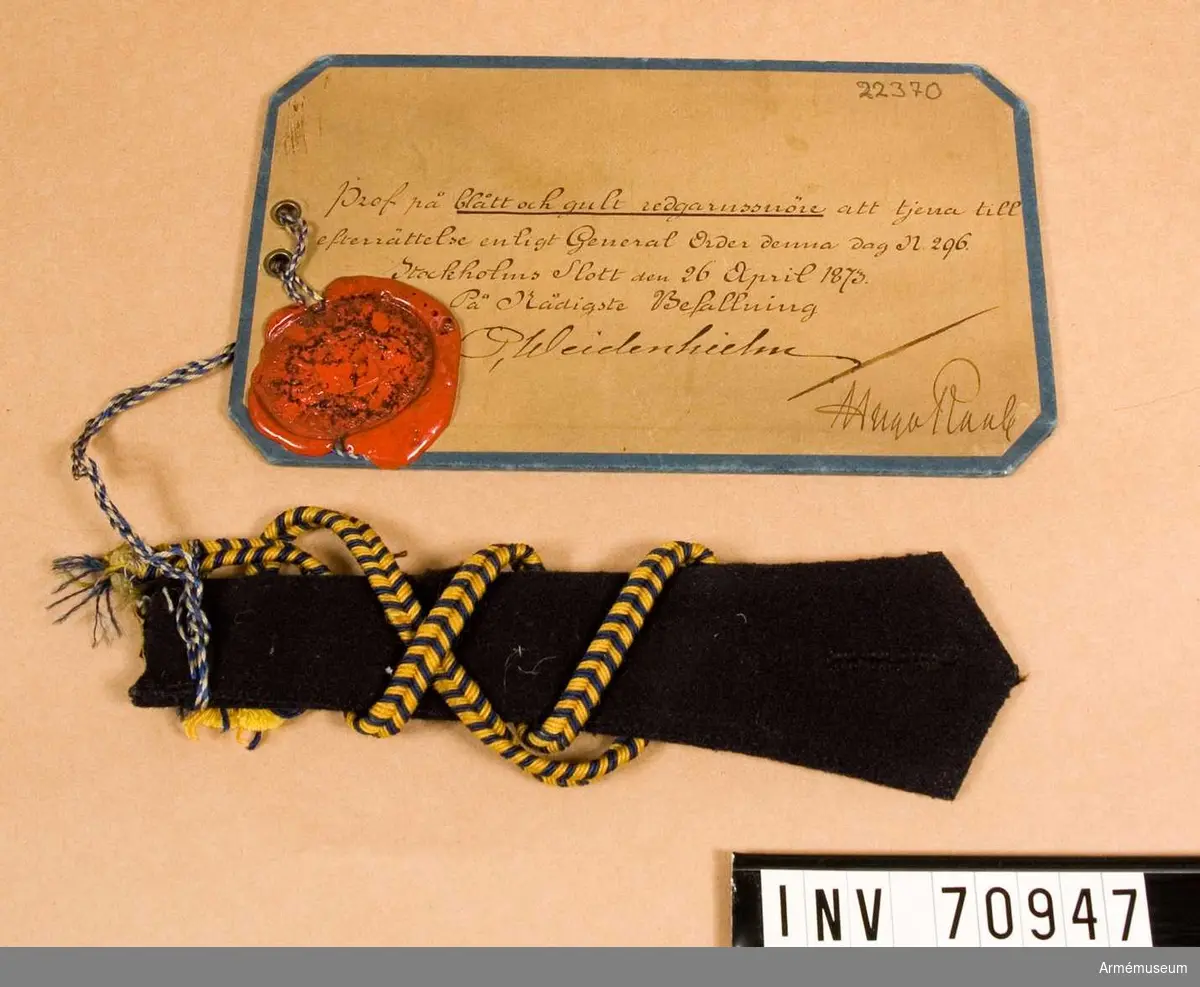 Grupp C.I.
Prov på blått och gult redgarnssnöre att tjäna till efterrättelse enligt generalorder nr 296 den 26 april 1873.