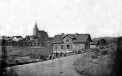 Ö. Akers kirke med prestegaard samt skole og klokkergaard.