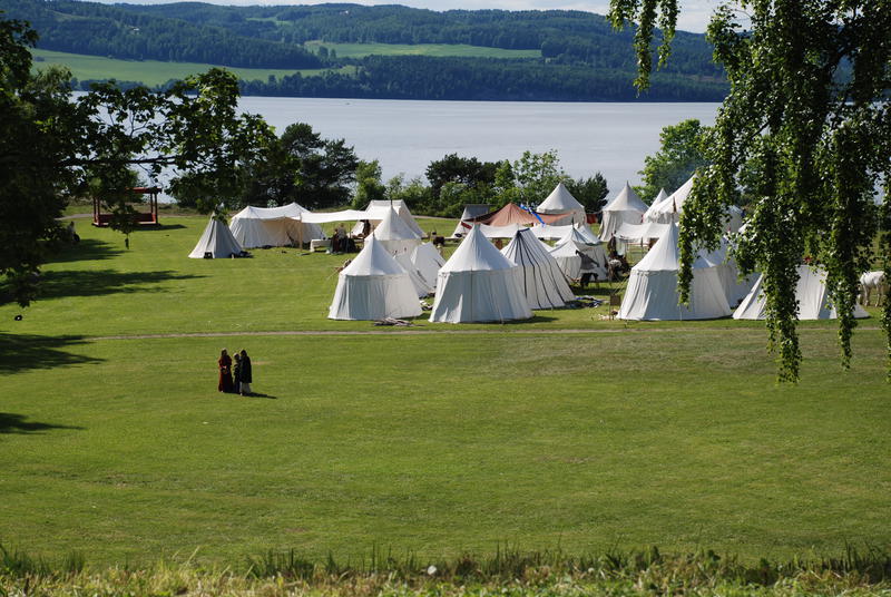 Medieval campsite with tents by Lake Mjøsa
