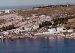 Flyfoto over Nordlandet i Kristiansund hvor vi ser et naust,
