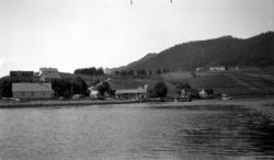 Foto av bygda Flemma i Gjemnes. Vi ser det gamle forsamlings