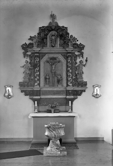 Altaruppsats i Pjätteryds kyrka, tillverkad 1731 av Sven Segervall, Växjö.
Numera använt som dopaltare.