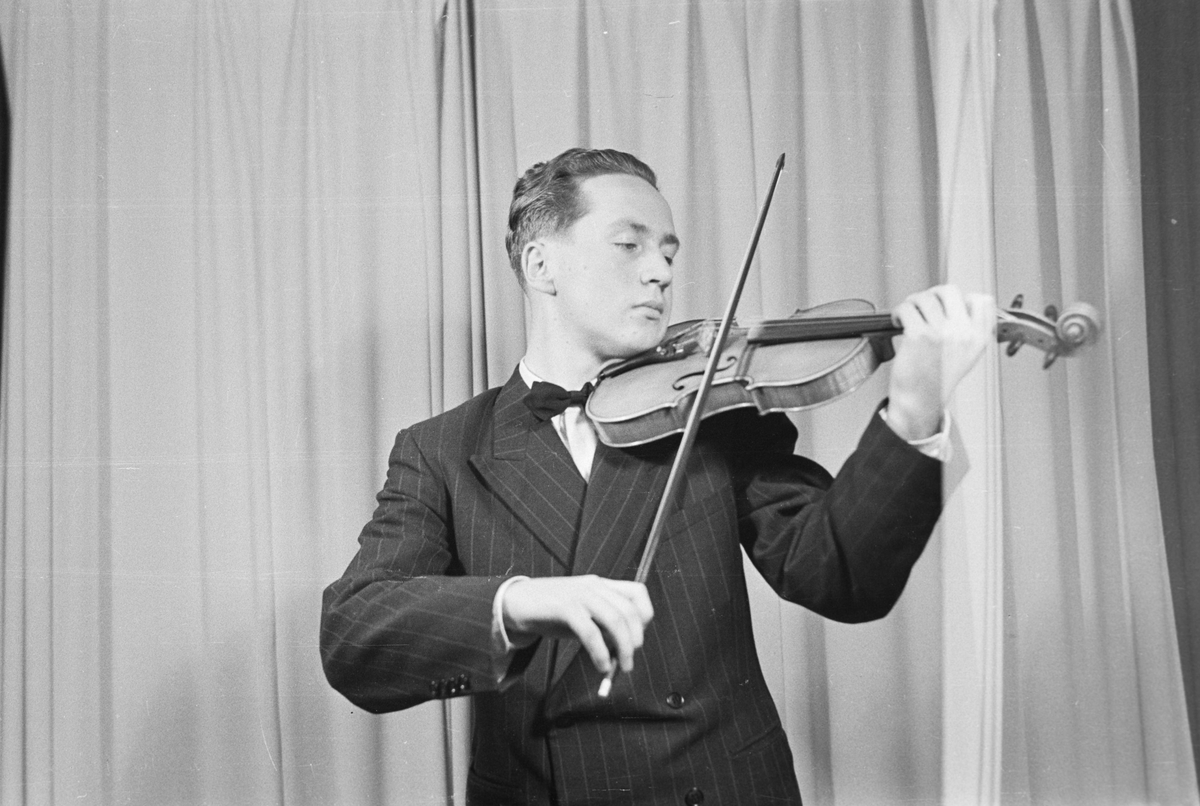 En musiker med fiolin,ukjent