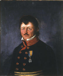 Portrett av Peter B. Prydz. Mørk uniform, orden festet til brystet.