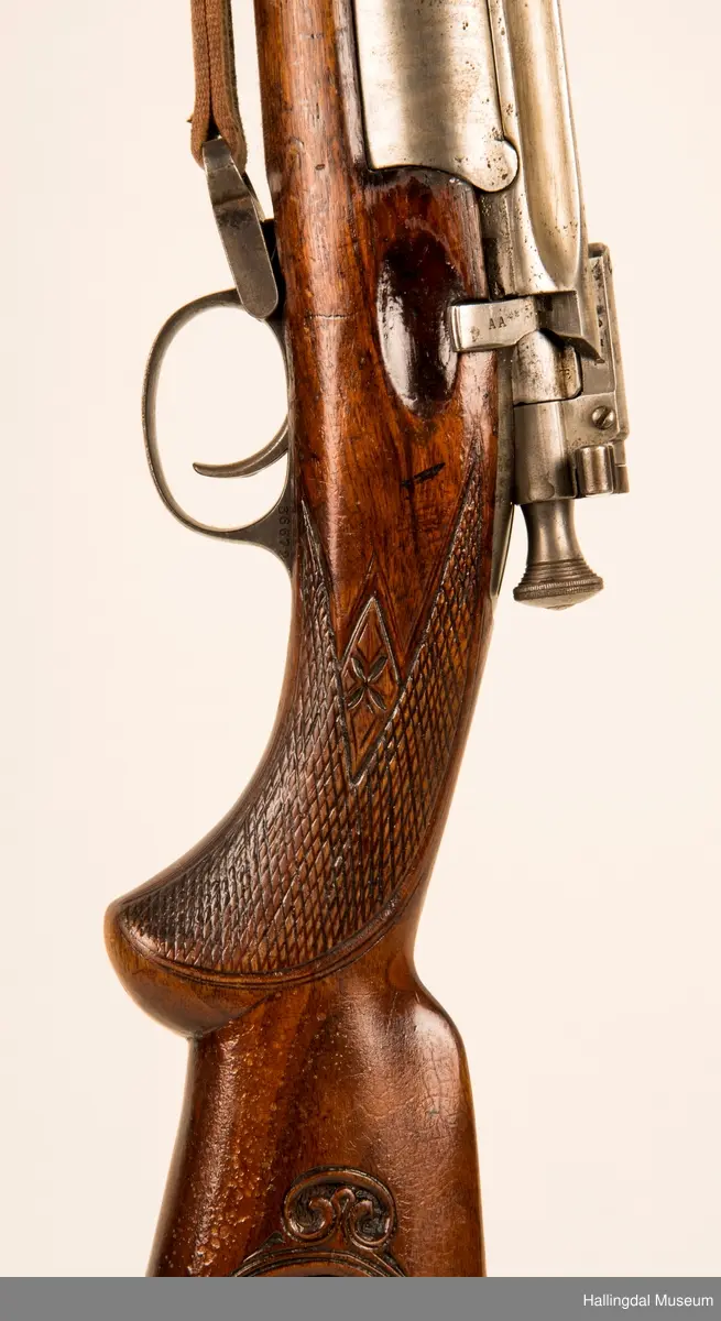 Utskjært motiv: Jeger med hund.