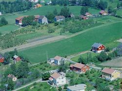Flyfoto, Lillehammer, bebyggelse. I bakgrunnen Hammerseng Gå