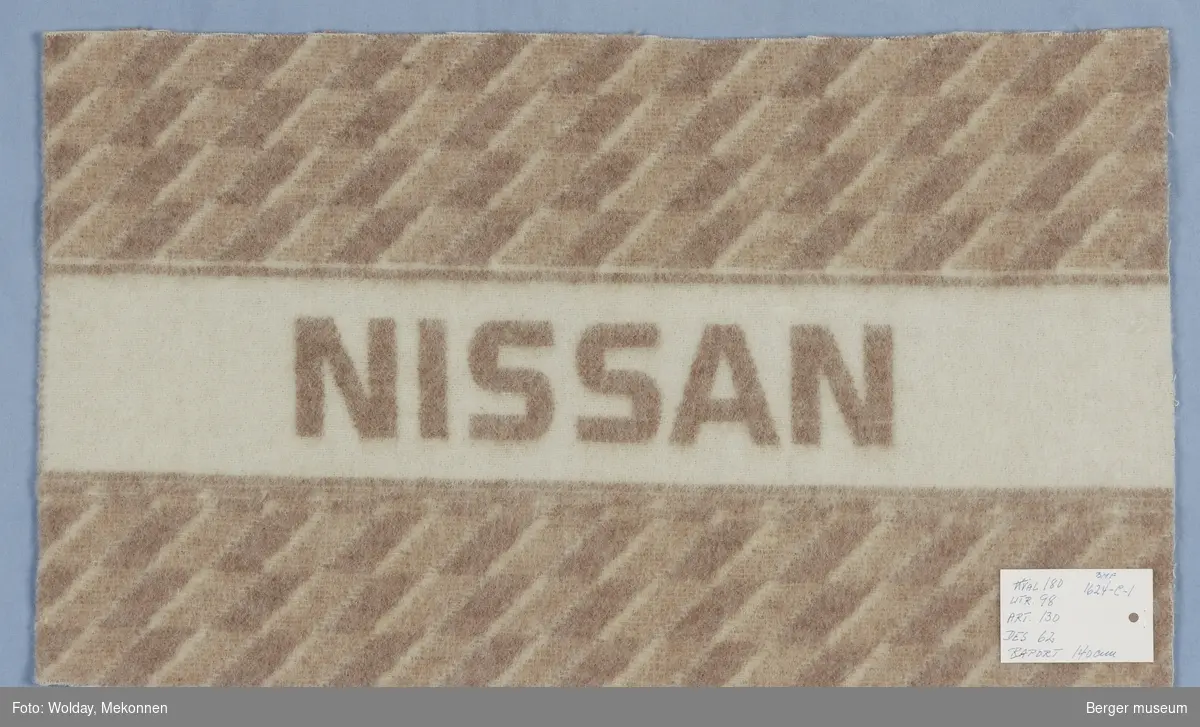 Bilpledd
Små romber
Logo Nissan