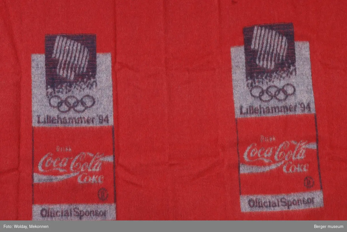 Lite ullpledd med OL Lillehammer, OL-ringer Coca Cola logo, og Official Sponsor.
Møllsikret. 