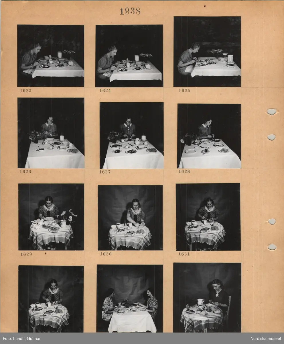 Motiv: En kvinna i klänning sitter vid ett dukat kvadratiskt bord med vit duk och äter, blomvas, en kvinna i klänning sitter vid ett dukat litet runt bord med duk och äter, två kvinnor i klänning sitter vid ett dukat kvadratiskt bord med vit duk och äter.