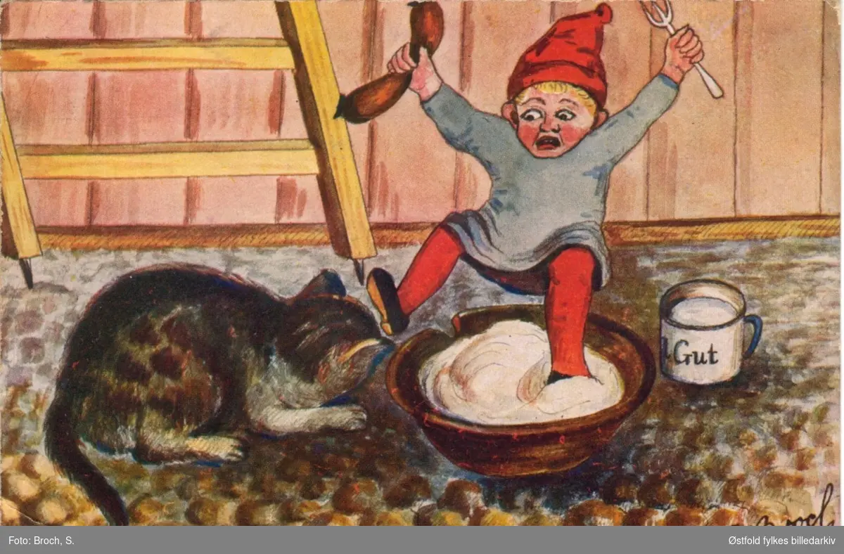Julekort.Tegning av nisse og katt med julegrøt. Signert S. Broch. Poststempla 1919.