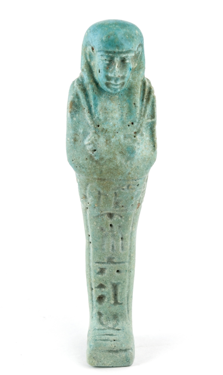 Figurer i form av egyptiska mumier, porslin, 2 stycken, grönblåfärg, en trasig.