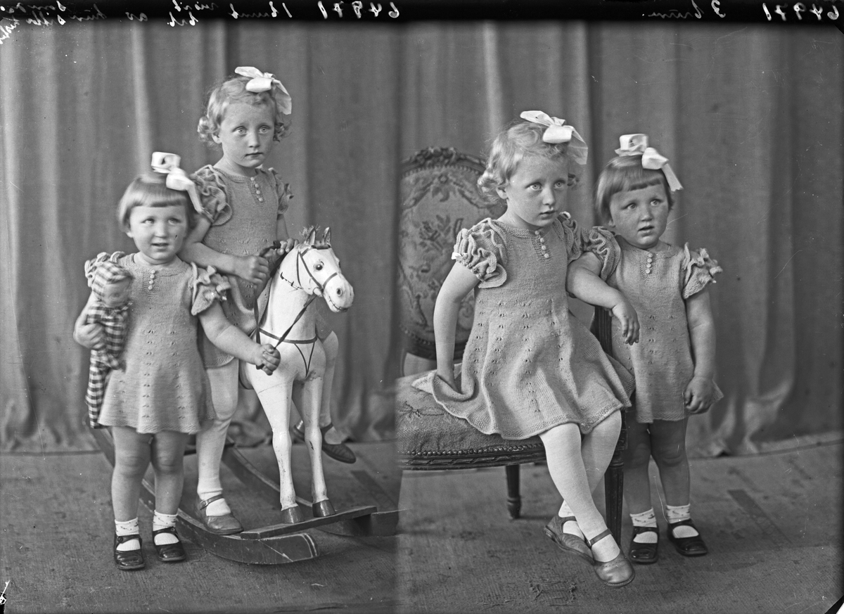 Portrett. Familiegruppe på to. To småpiker poserer med en stol og en gyngehest hos fotografen. Søstre. Bestilt av Fru Karina Nordbø. Espevik