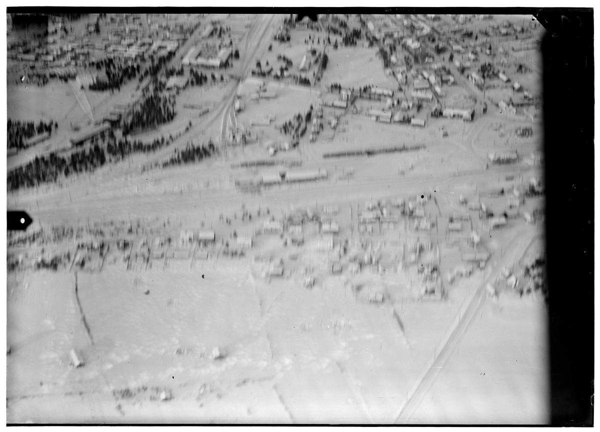 Flygfotografi av delar av Rovaniemi samhälle. Lodbild tagen av flygare vid F 19, Svenska frivilligkåren i Finland under finska vinterkriget, 1940.