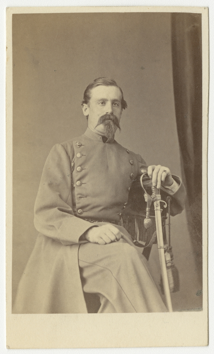 Porträtt av Johan Robert Mauritz Hallman, underlöjtnant vid Fortifikationen.

Se även bild AMA.0009443 och AMA.0009583.